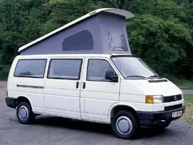 A white van with an open roof on the road.