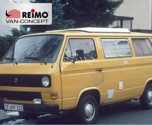 A yellow van parked on the side of a road.