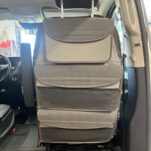 A car seat with the back seats folded down.