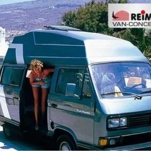 A woman standing in the door of an rv.