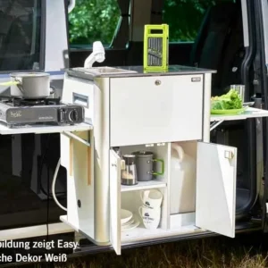 A white cabinet with a green handle and a cup holder.