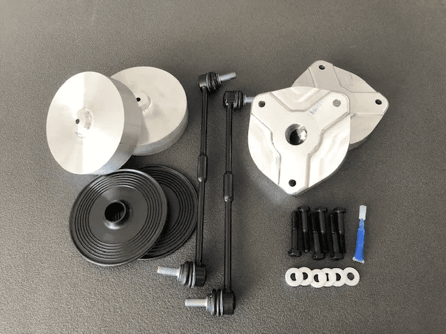 A table with some parts of the same type of equipment